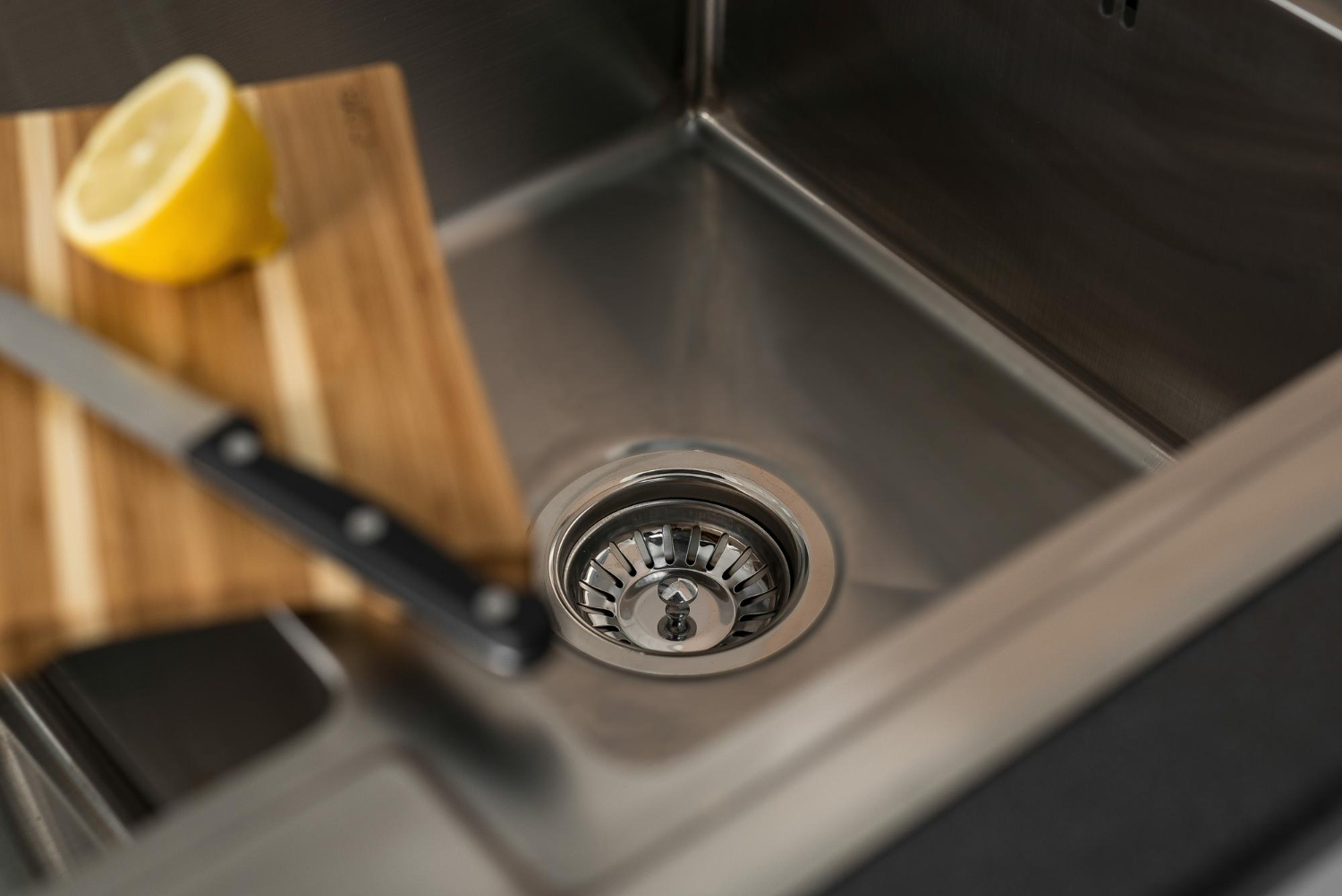 clean a kitchen drain